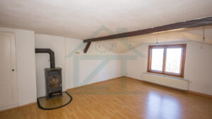 Wohnzimmer mit Kaminofen DG (WE 3)