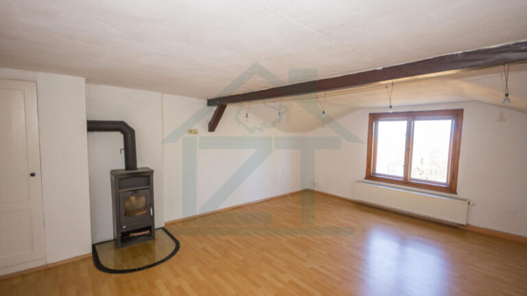 Wohnzimmer mit Kaminofen DG (WE 3)